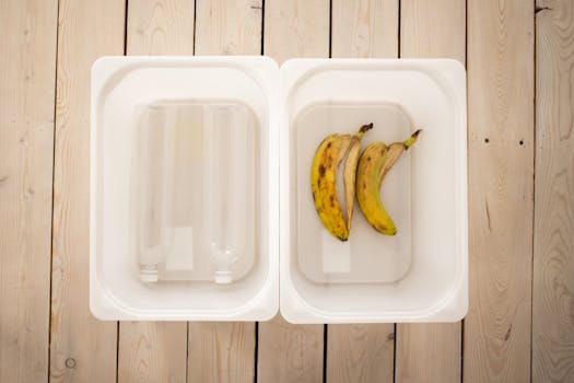 Homemade compost bin made from a plastic container